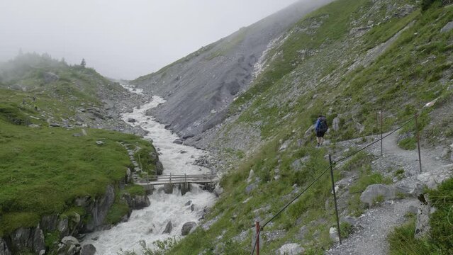 Man hiking in the swiss alps. Panasonic Lumix S1 ProRes422HQ (4K, 29.97fps, Vlog basic color correction)