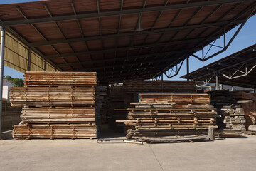 a wood warehouse, stacked wood