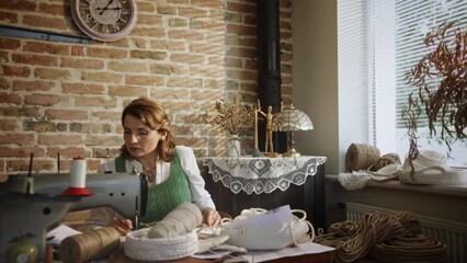 A handmade workplace at the home of an adult woman who makes warm clothes for the home