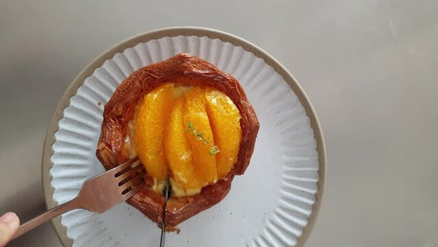 Peach pie fruit tart cake cutting eating in cafe coffee shop top view