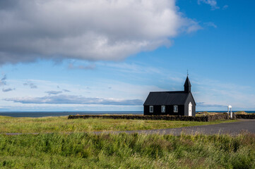 Fototapeta na wymiar Budakirkja black church on Snaefellsnes peninsula in Iceland