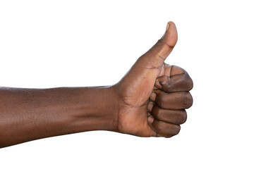 Closeup of male hand showing thumbs up sign against white background
