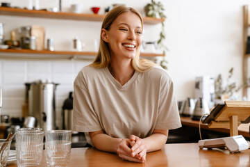 Young beautiful attractive long-haired smiling woman looking aside