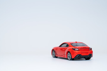 Obraz na płótnie Canvas ミニカーの赤いスポーツカー
