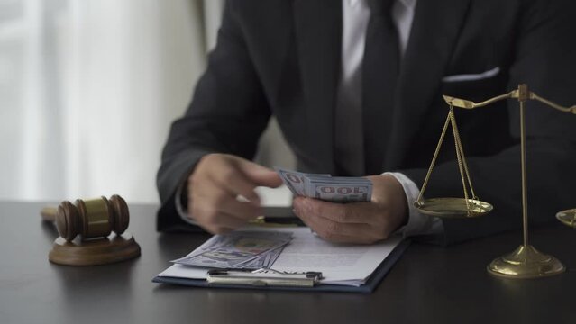 Corrupt lawyers count money, hide bribes in shirts. forgery of documents Corrupt judges or bidders counting money in the blackroom. Black market. Criminals. Dirty judges counting dollars.