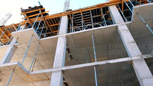 The process of creating a floor. Formwork flooring. Interior of a building under construction. Formwork rack