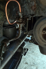 Engine with oil leaks. Old dusty motor closeup