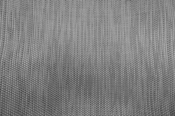 the texture of the woven fabric is gray