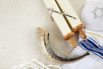 Yom kippur concept. Tallit, Thorah and Shofar jewish religious symbols