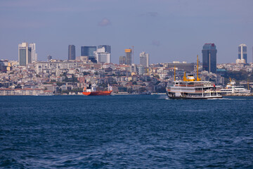 Fototapeta premium silhouette Istanbul city buildings from water Bosphorus or Golden Horn, public places.