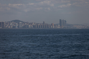 silhouette Istanbul city buildings from water Bosphorus or Golden Horn, public places.