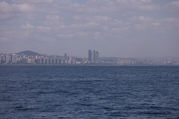 silhouette Istanbul city buildings from water Bosphorus or Golden Horn, public places.