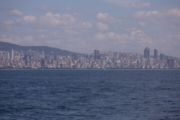 silhouette Istanbul city buildings from water Bosphorus or Golden Horn, public places.