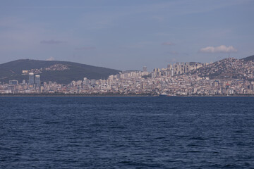 Fototapeta premium silhouette Istanbul city buildings from water Bosphorus or Golden Horn, public places.