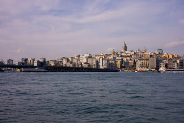 Fototapeta na wymiar silhouette Istanbul city buildings from water Bosphorus or Golden Horn, public places.