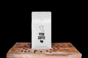 Peru coffee beans and white package on wooden board with black isolated background