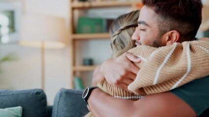 Happy couple celebrate pregnancy test results in home lounge with love, hug and kissing. Young woman, smile man and surprise people excited for good news, fertility and pregnant announcement together