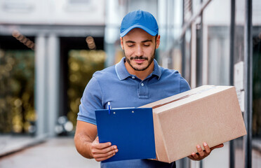 He never late. Delivery man with a package