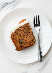 Directly above shot of a slice of carrot cake on plate