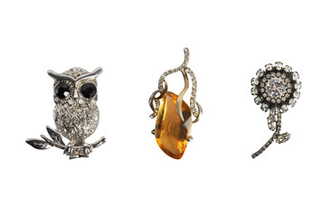 Jewelry set of 3 vintage brooches - owl, drop and flower shape brooches, fashion accessories, isolated photo.