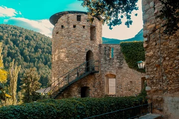 Fototapeten Portella Tower, the only remains of the ancient wall that enclosed the medieval village of Bagà, Barcelona, Spain. © Manuel Milan