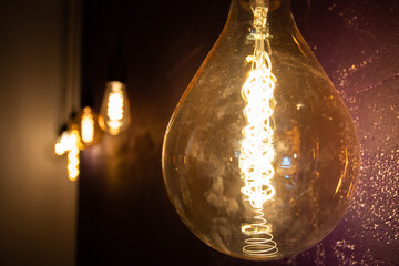 edison retro lamps, vintage lightbulb in loft interior Close up