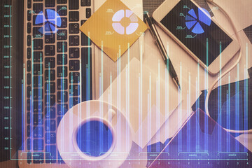 Double exposure of financial chart drawing over table background with computer. Concept of research and analysis. Top view.