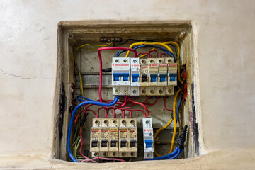 Close up of electrical panel with wiring and miniature circuit breaker