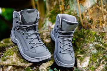 Elegant brand new hiking boots in natural environment