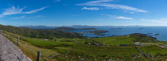 panorama landscape of the picturesque coastline and Kenmare Bay in County Kerry of western Ireland
