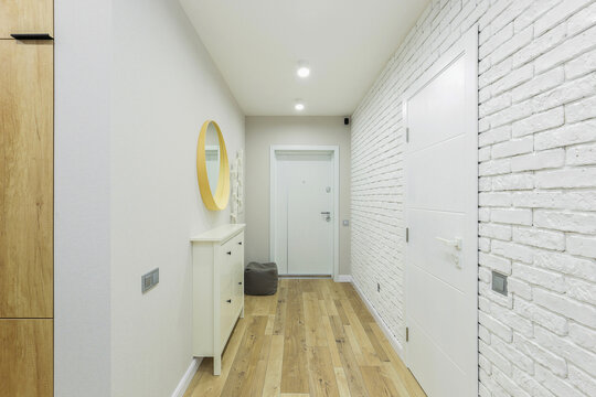 White entrance door inside an apartment