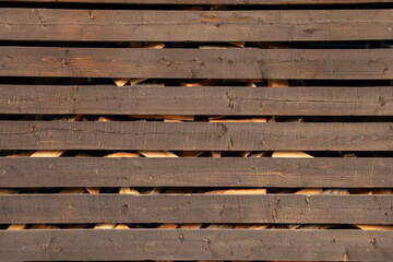 Logs as a background, Carpathian forest, logs for the winter