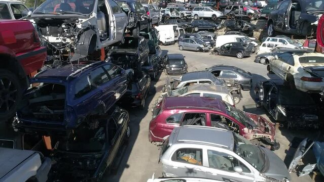 Junk Yard with Old Cars and Wreck