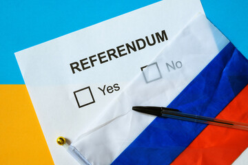 Referendum ballot paper, Russian flag and pen on table in Ukraine, top view