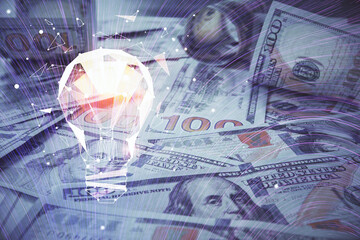 Double exposure of light bulb drawing over usa dollars bill background. Concept of idea.