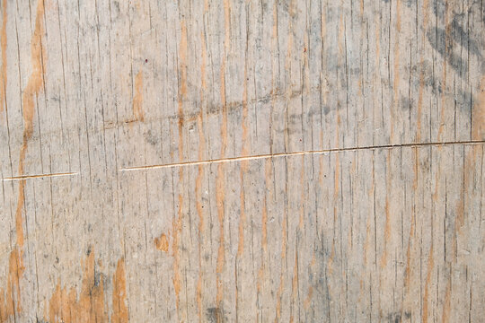 The texture of orange plywood. The texture of the smooth surface of plywood. Top view of the plywood background.