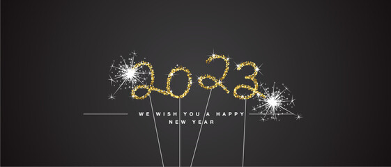 We wish you Happy New Year 2023 eve handwritten tipography golden glitter stars sparkler fireworks black background greeting card