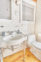 White tile, styled bathroom. Interior design. 