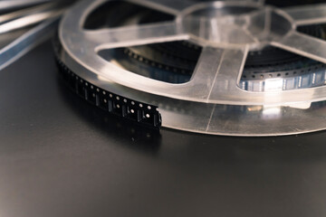 Macro closeup indoor shot of professional tape with SMD electronic parts ready to be used for montage. Gray background. High quality photo