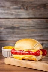 Sausage sandwich with melted cheese.