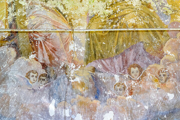 frescoes on the walls of an abandoned temple, angels