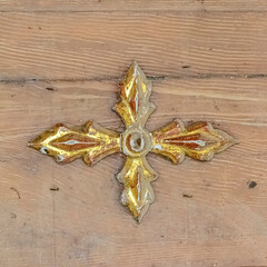 the decor element is a vintage cross