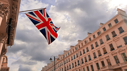 National flag of Great Britain on building in London city - Powered by Adobe