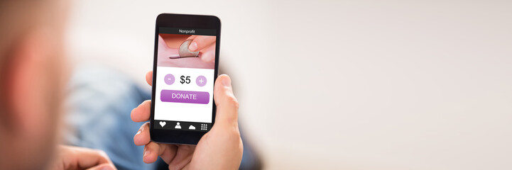 Close-up Of A Hand Holding Cell Phone