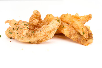 fish chicharrones and french fries on white background isolated