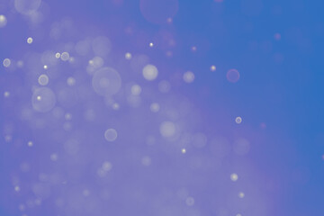 Naklejka premium abstract light bokeh background with purple gradient pattern.