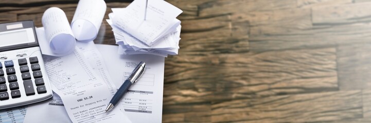 Calculator And Pen On Receipt