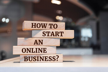 Wooden blocks with words 'How To Start An Online Business?'.