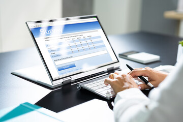 Woman Filling Survey Poll Or Form