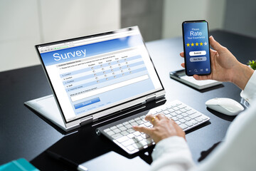 Fototapeta na wymiar Businessperson Filling Online Survey Form